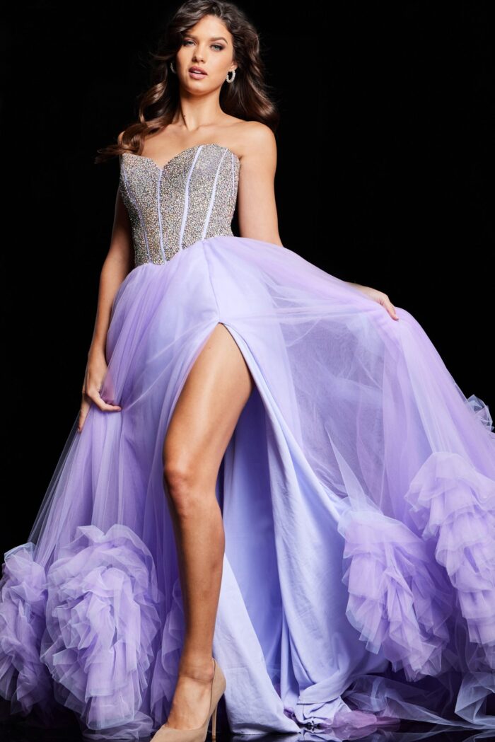 Model wearing Jovani 37199 lilac ball gown with flowing tulle skirt, front view.