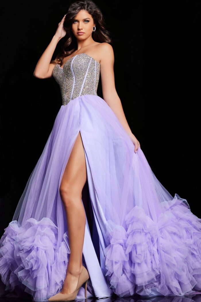 Front view of model wearing Jovani 37199 lilac gown with embellished bodice and high slit.