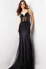 Model wearing Jovani 37202 black gown with beaded bodice and sweetheart neckline, front view.