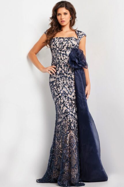 Model wearing Jovani 37203 navy dress with lace embroidery and square neckline.