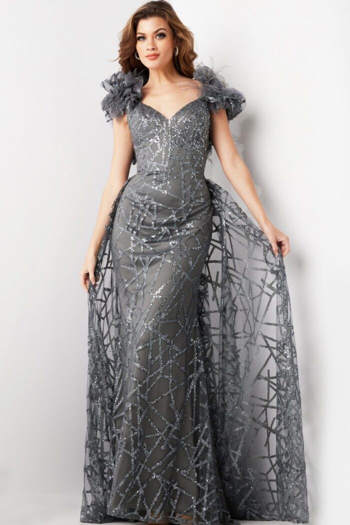 Model wearing Jovani 37206 gray dress with ruffled cap sleeves and sequin details, front view.