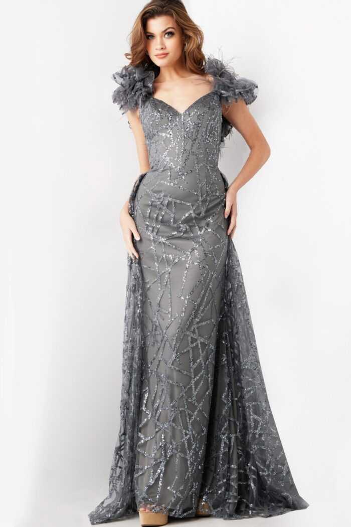 Model wearing Jovani 37206 gray dress with geometric sequins and ruffled shoulder details, full length.