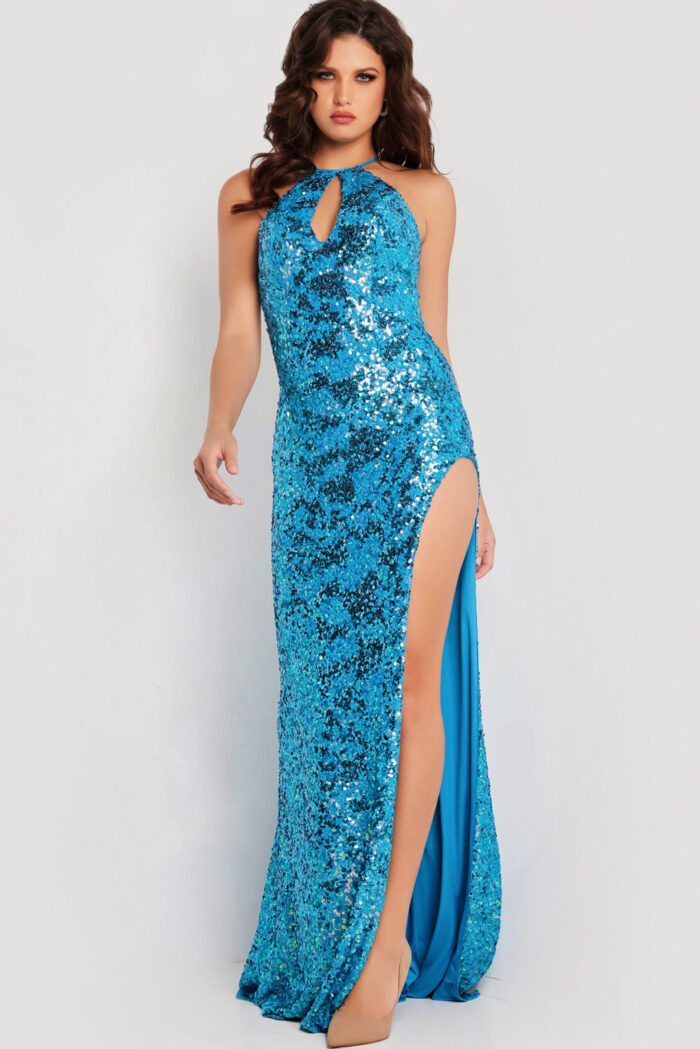 Model wearing 37245 blue sequin gown showing high slit, front view.
