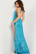 Model wearing 37245 blue sequin gown showing open back, back view.