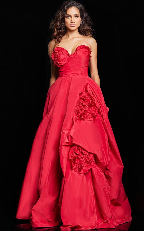 Model wearing Jovani 37266 red gown with rosette embellishments from front view.