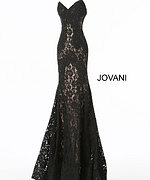 Jovani 37334 black lace mermaid gown with sweetheart neckline on a display.