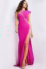 Model wearing Jovani 37342 fuchsia gown with high slit and embellishments, front view.