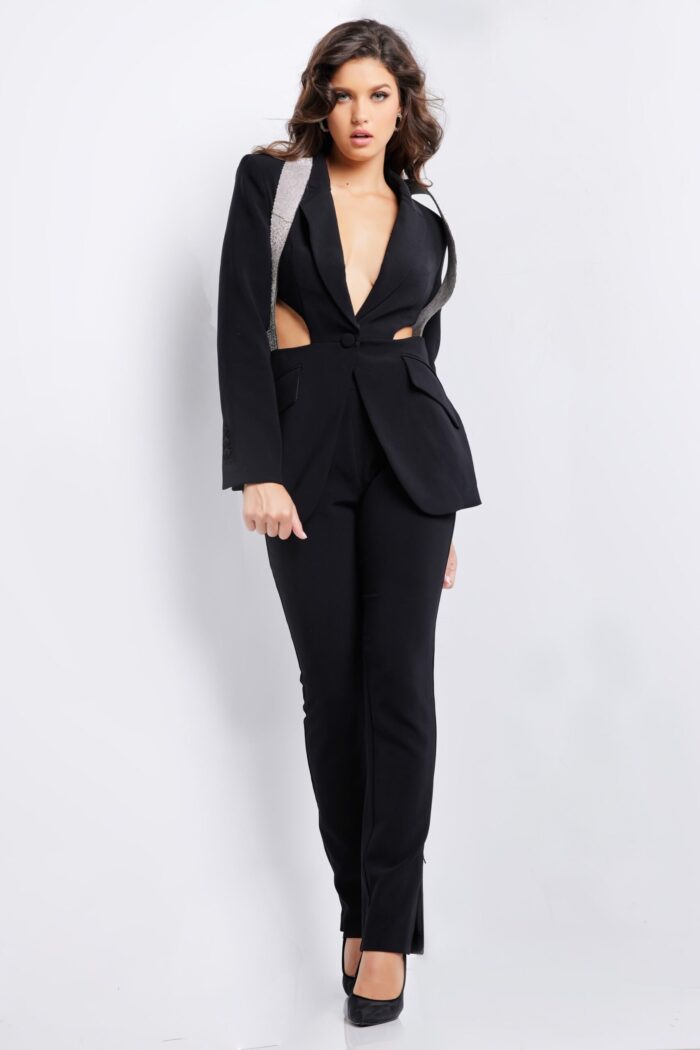 Model wearing Jovani 37347 showing the front with deep V-neckline and fitted silhouette.