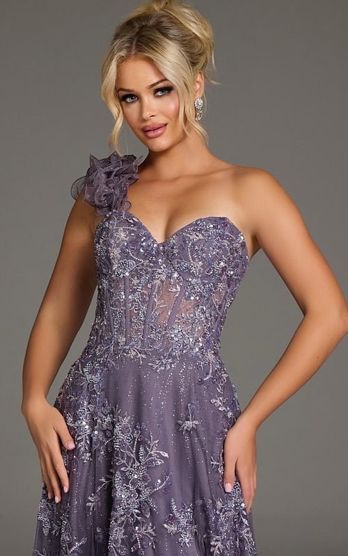 Model wearing Jovani 37353 navy gown, close-up front view focusing on the corset-style bodice and ruffled shoulder strap.
