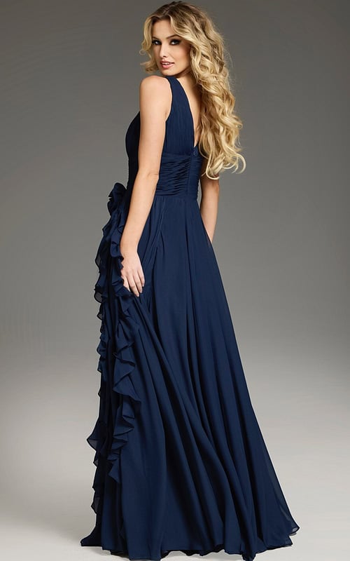 Model wearing Jovani 37374 navy gown with A-line silhouette, back view.