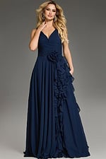 Model wearing Jovani 37374 navy gown with A-line silhouette and ruffle detail, front view.