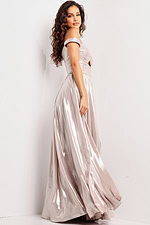 Side view of model wearing Jovani 37381 blue gown with elegant flow.