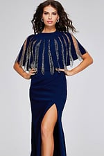 Model wearing Jovani 37386 navy dress front view showcasing embellished cape sleeves and high slit.