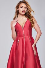 Close-up of Jovani 37393 red dress with V-neckline and zipper details.