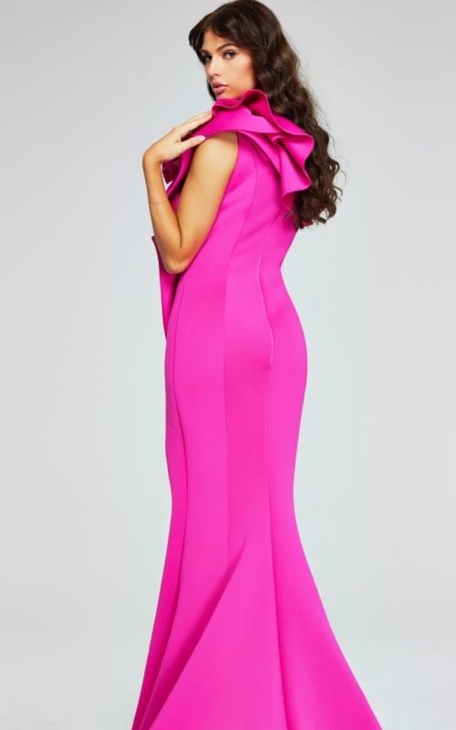 Back view of model in Jovani 37400 fuchsia gown with elegant design.