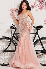 Model wearing Jovani 37412 blush dress with embellished bodice and tulle skirt, front view.