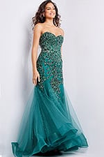 Model wearing Jovani 37412 emerald mermaid gown with detailed beading, main front view.