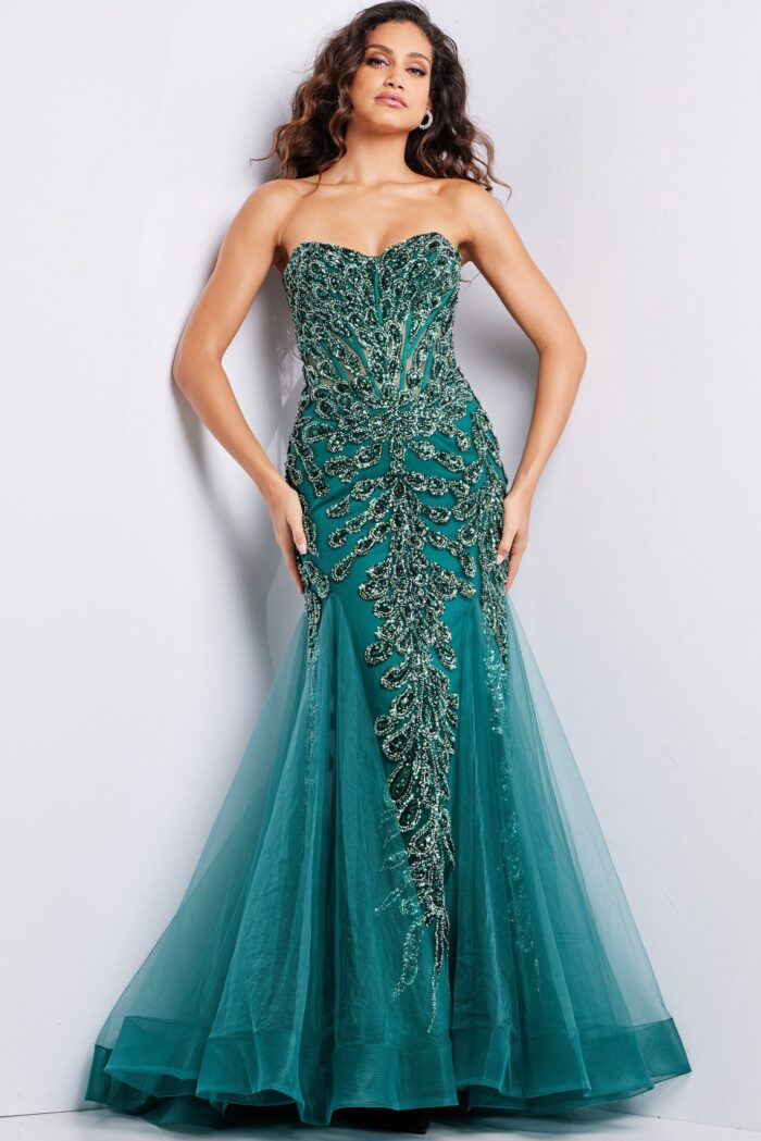 Model wearing Jovani 37412 green gown with embellished bodice and flowing skirt