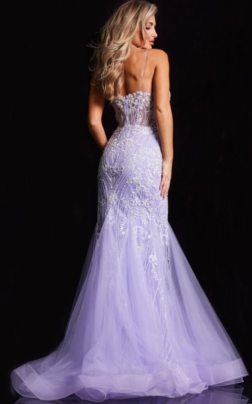 Back view of model in Jovani 37414 lilac mermaid gown with lace floral design.