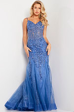 Model wearing Jovani 37416 blue dress with sheer bodice and flared skirt, front view.
