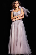 model wearing 37467 blush gown front view showing sweetheart neckline and floral embellishments