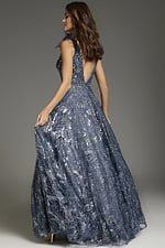 Back view of Jovani 37551 gown, showing low scoop design and flowing skirt