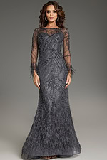 Model wearing Jovani 37560 in gray, featuring a long elegant silhouette with sheer beaded sleeves and a feathered skirt.