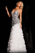 Model showcasing front view of Jovani 37588 with mirror accents and elegant ruffles.