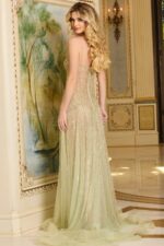 Back view of Jovani 37593 highlighting the elegant flow and detailing of the light mint gown.