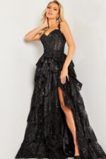 Model wearing Jovani 37630 black evening gown with sweetheart neckline