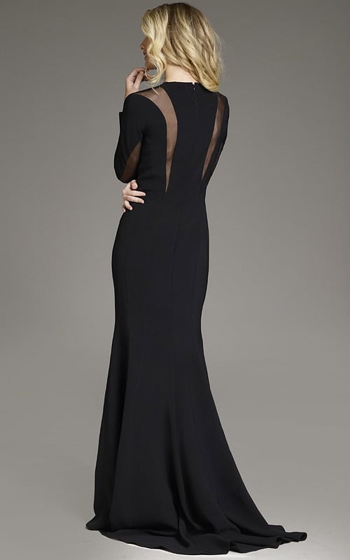 Back view of model wearing Jovani 37671 black dress with sheer mesh accents and fitted silhouette.