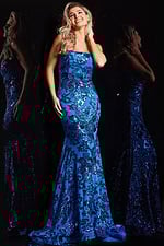 Model wearing Jovani 37687 blue mermaid dress with sequined floral design, front view.