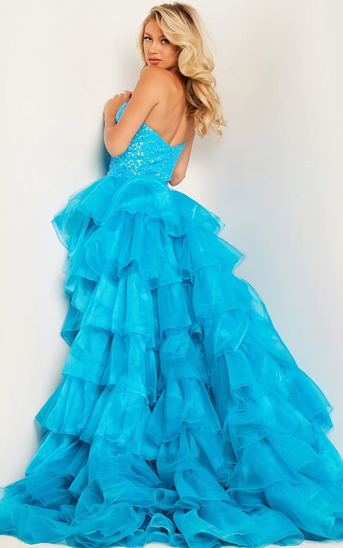 Model wearing dress 37689, back view showcasing layered skirt.