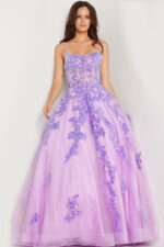 Model wearing Jovani 37700 lilac ball gown with floral appliqué and beadwork, front view.