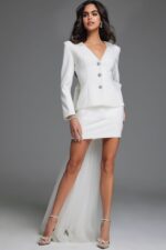 model wearing Jovani 38084 white dress with tailored bodice and flowing tulle