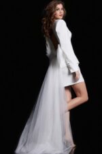 model wearing Jovani 38084 white dress with open back and tulle train, back view