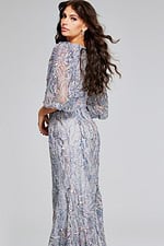 Model displaying Jovani 38110 gray dress side and back view with intricate sequin work.