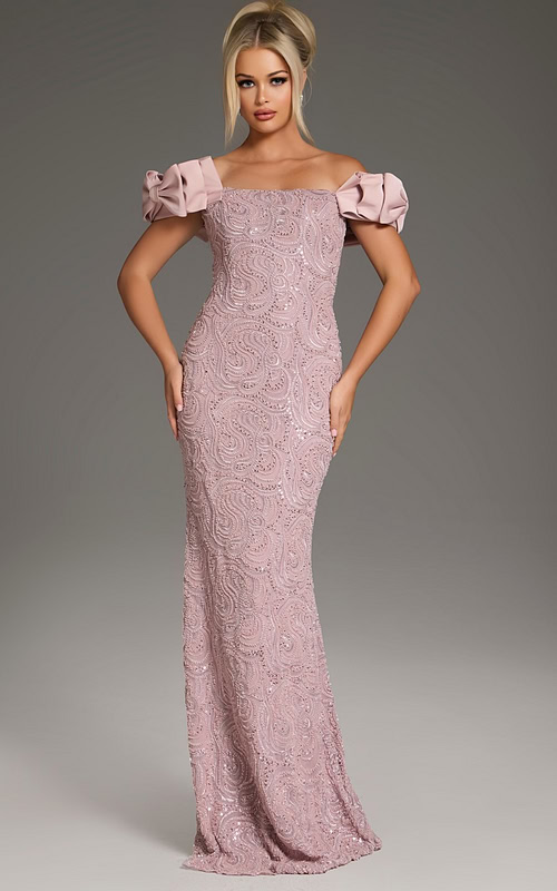 Model wearing Jovani 38112 blush mermaid gown with off-shoulder ruffled sleeves, front view.