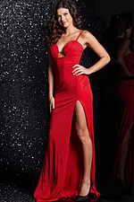 Model in 38142 red dress with sweetheart neckline and high slit, front view full length.