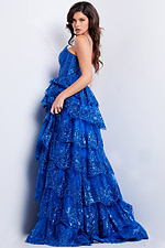 Model in front view of 38144 Royal gown, showing layered ruffles.