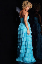 model showcasing the back of Jovani 38167 blue tiered dress