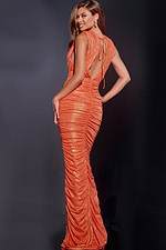 Model wearing Jovani 38238 orange gown with V-neckline and open back, back view.