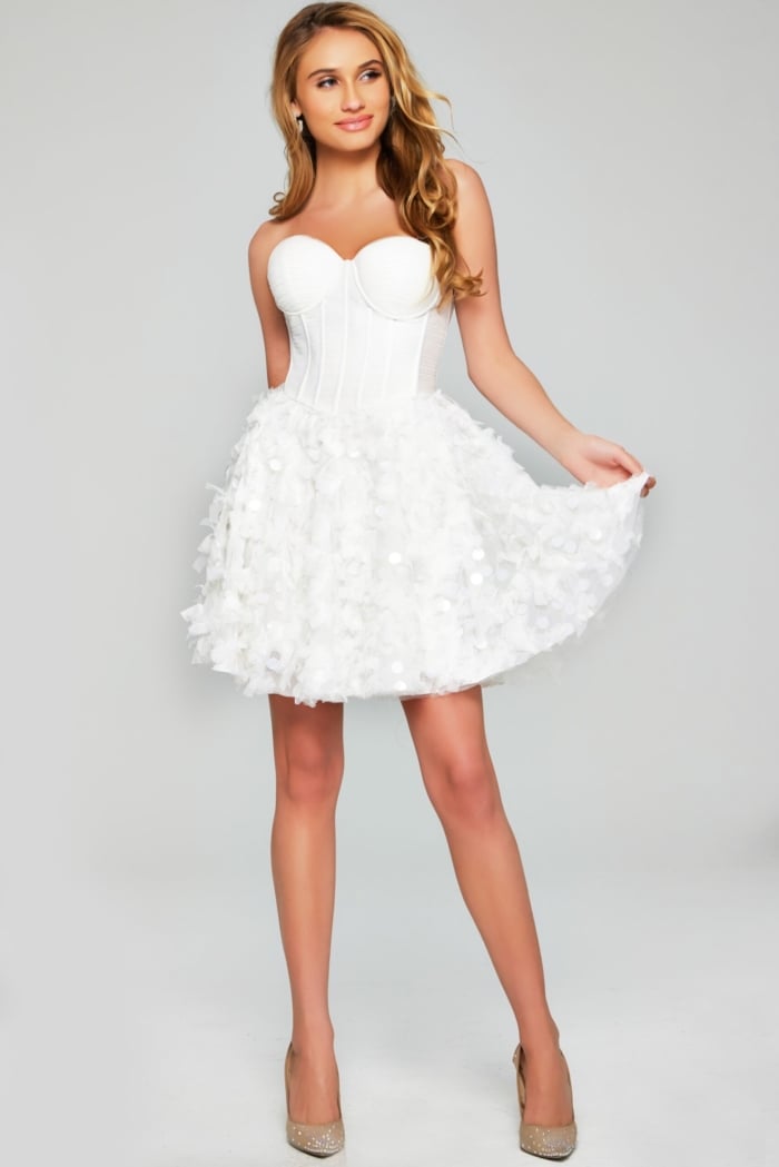Model wearing Jovani 38248 white dress, back view showing strapless design and flared skirt