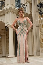 Model wearing Jovani 38263 dress showcasing teal embellishments, front view.