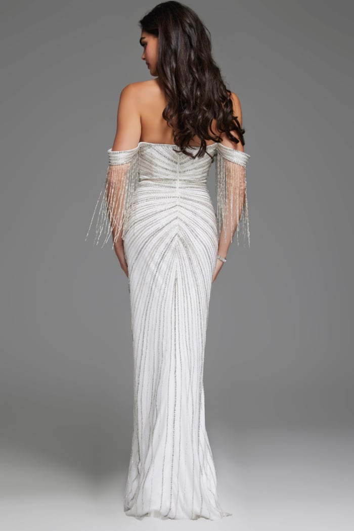 Back view of model wearing Jovani 38274 white gown highlighting the off-the-shoulder design and fitted silhouette.