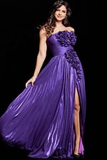 Model wearing Jovani 38280 purple gown, highlighting flow and floral details, front view.