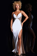 Model wearing Jovani 38308 in white with a high slit and beaded sides.