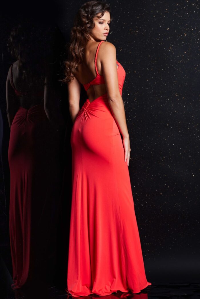 Model wearing Jovani 38309 pink dress, back view showing sleek design