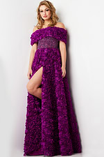 Model wearing Jovani 38318 purple dress with off-the-shoulder floral design and high slit.