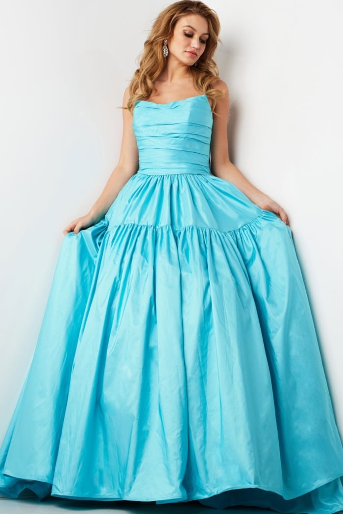 model wearing 38331, full-skirted turquoise dress with ruched bodice